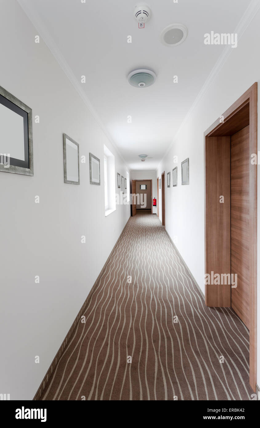hotel hallway with many doors Stock Photo Alamy