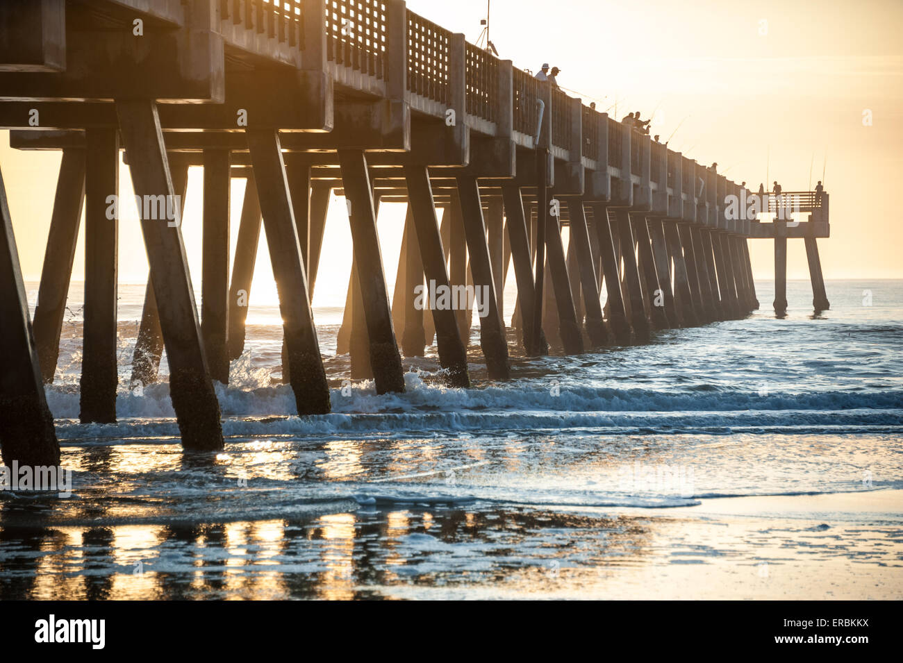 A beautiful Florida sunrise at Jacksonville Beach Pier. Stock Photo