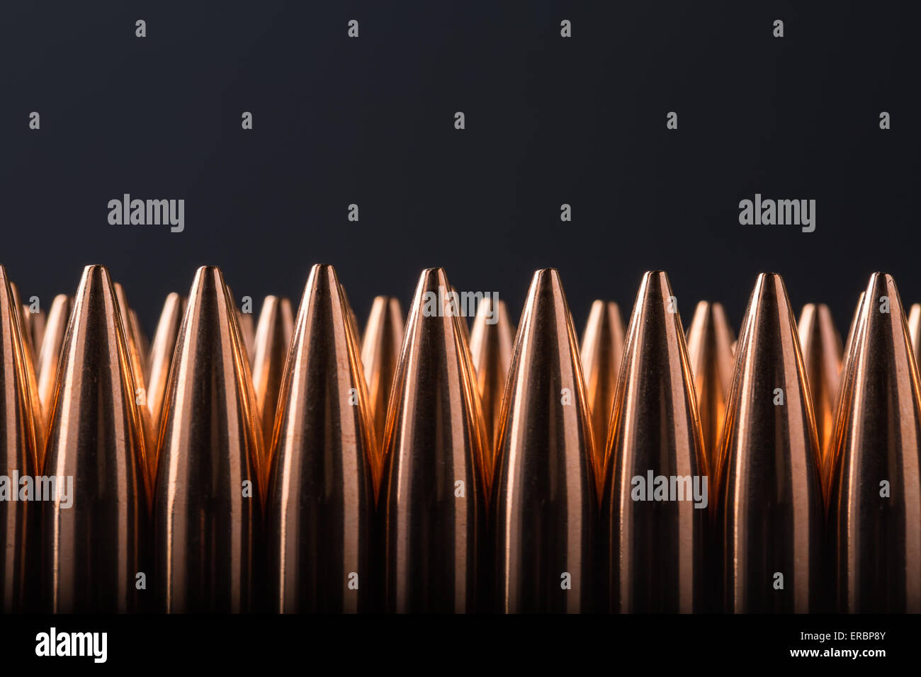 Macro shot of copper bullets that are in many row Stock Photo Alamy