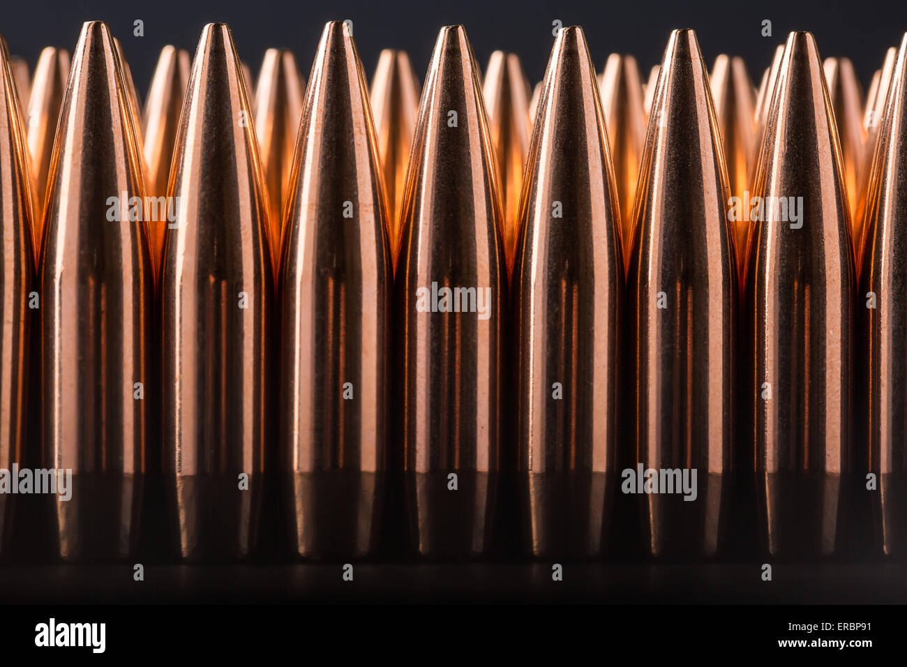 Macro shot of copper bullets that are in many row Stock Photo Alamy