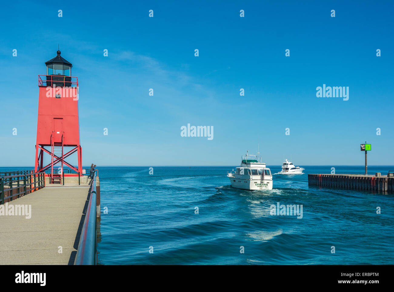 Michigan, Charlevoix, Pine River Channel, powerboats pass historic