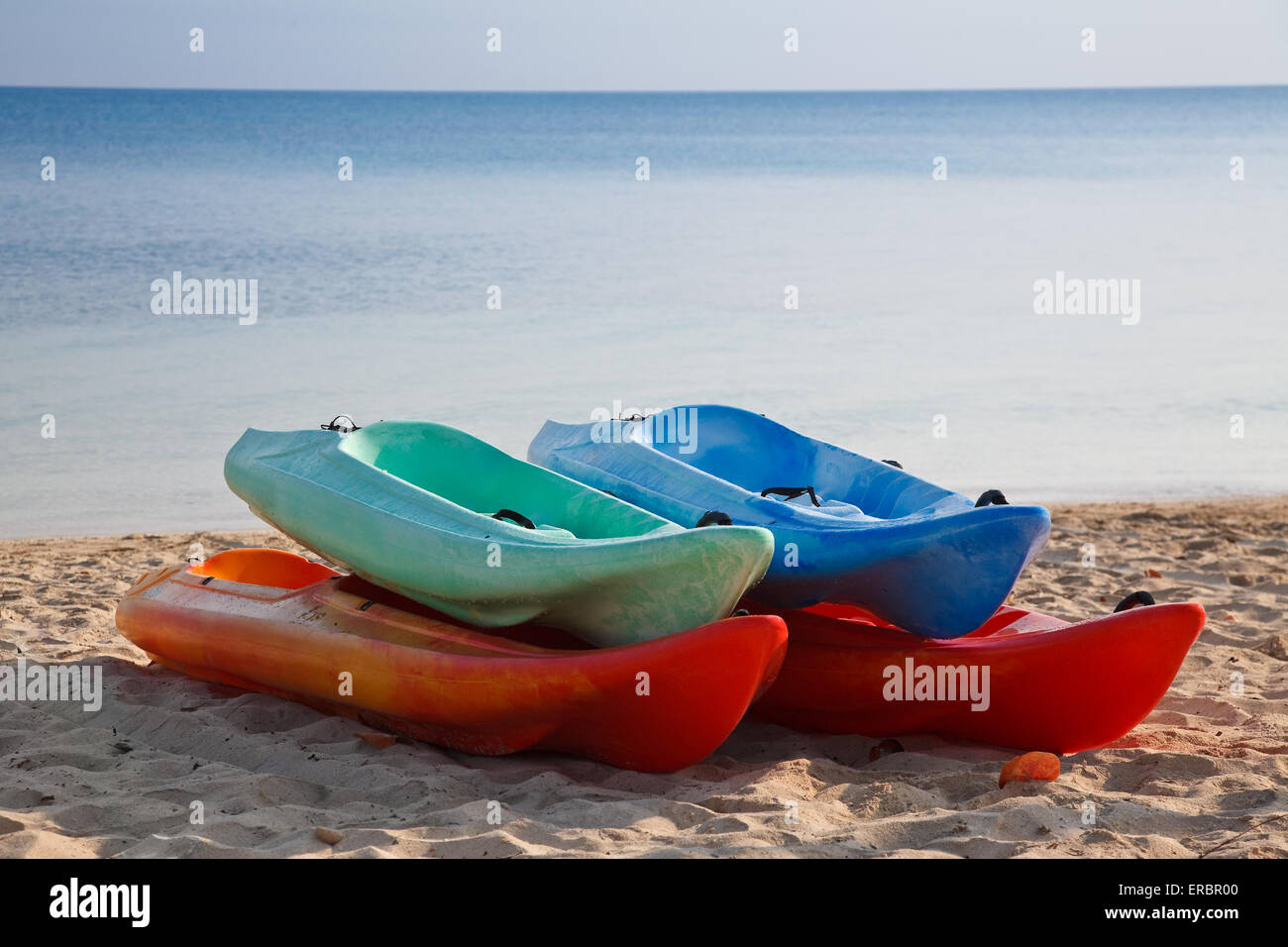 Recreational plastic boats on the beach Stock Photo