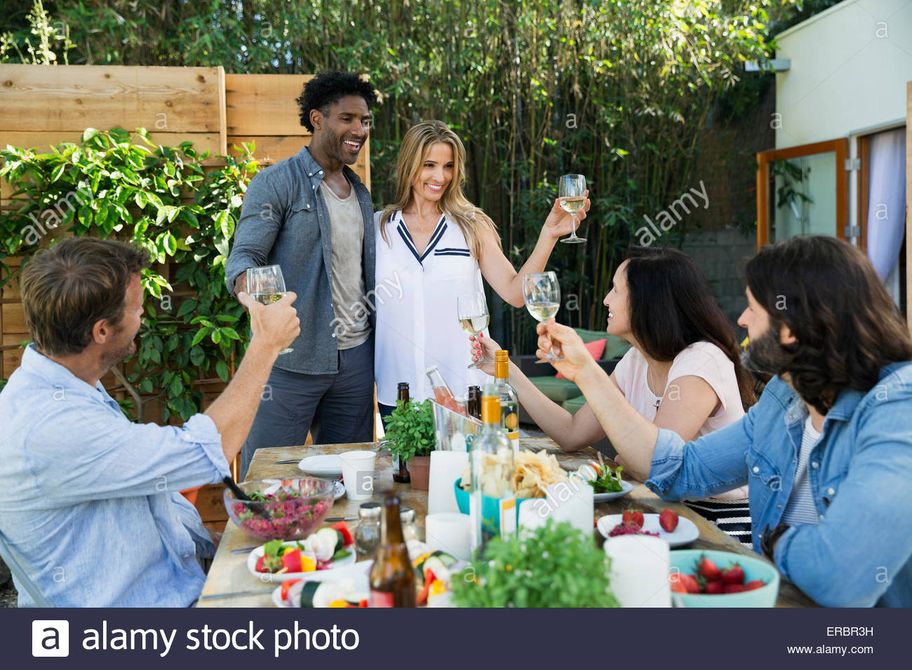 Man sitting table wine glasses hires stock photography and images Alamy