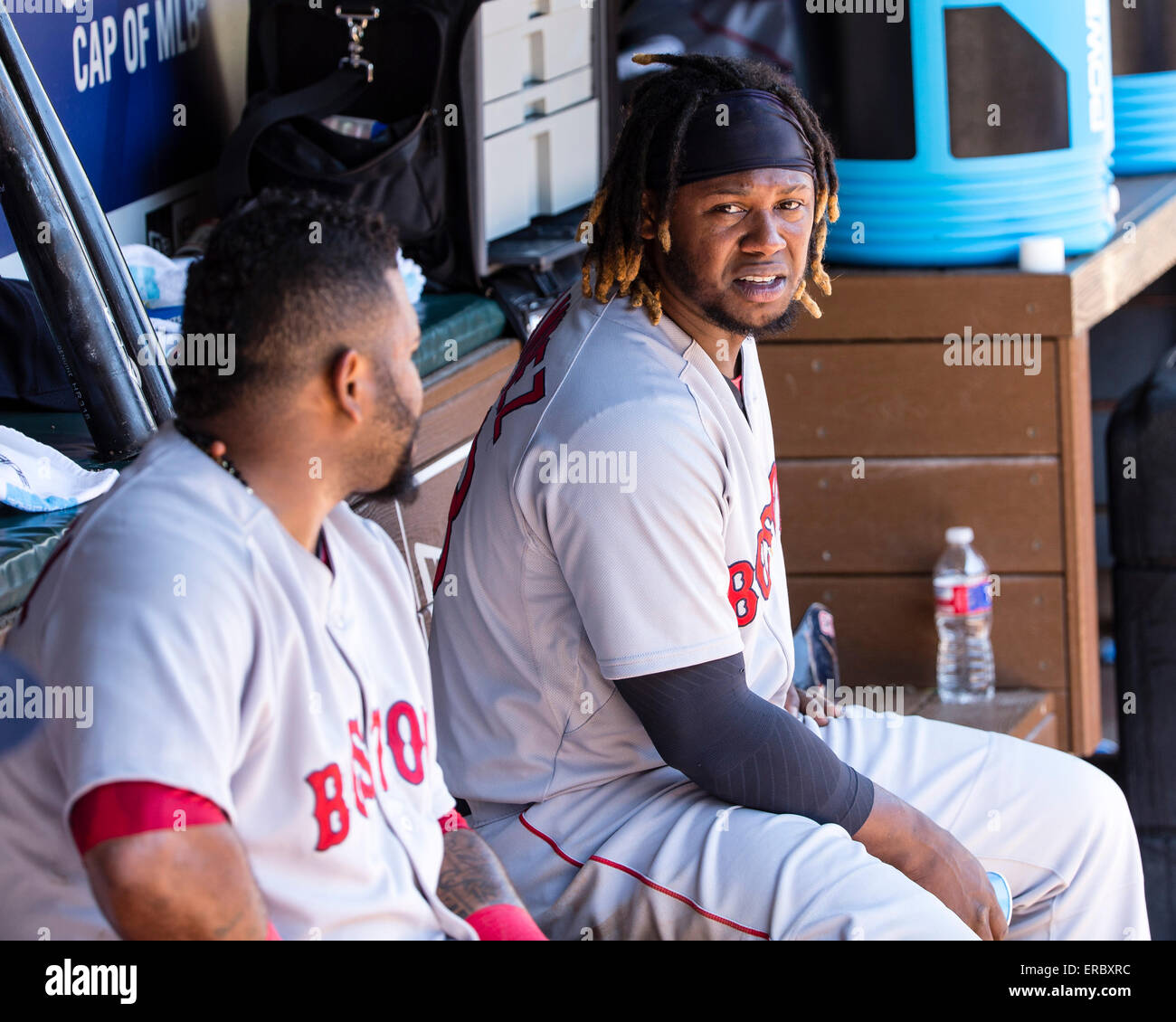 Arlington, TX, USA. 31st May, 2015. Boston Red Sox left fielder Hanley Ramirez (13) talks with Boston Red Sox third baseman Pablo Sandoval (48) on the bench during the the Major League Baseball game between the Boston Red Sox and the Texas Rangers at Globe Life Park in Arlington, TX. The Rangers defeated the Red Sox 4-3. Tim Warner/CSM/Alamy Live News Stock Photo
