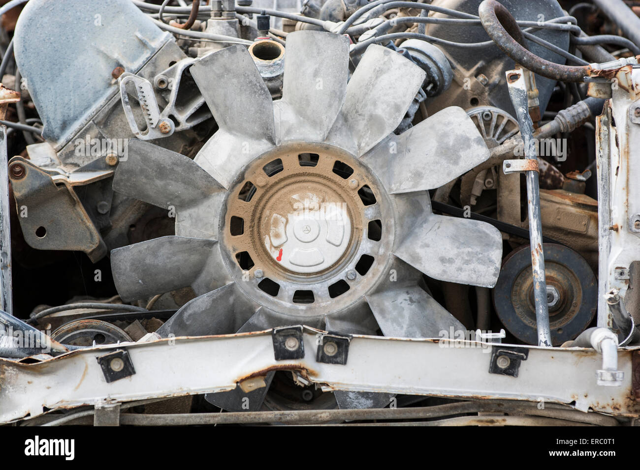 An old motor from a junked car found out in the dessert, Southern California. Stock Photo