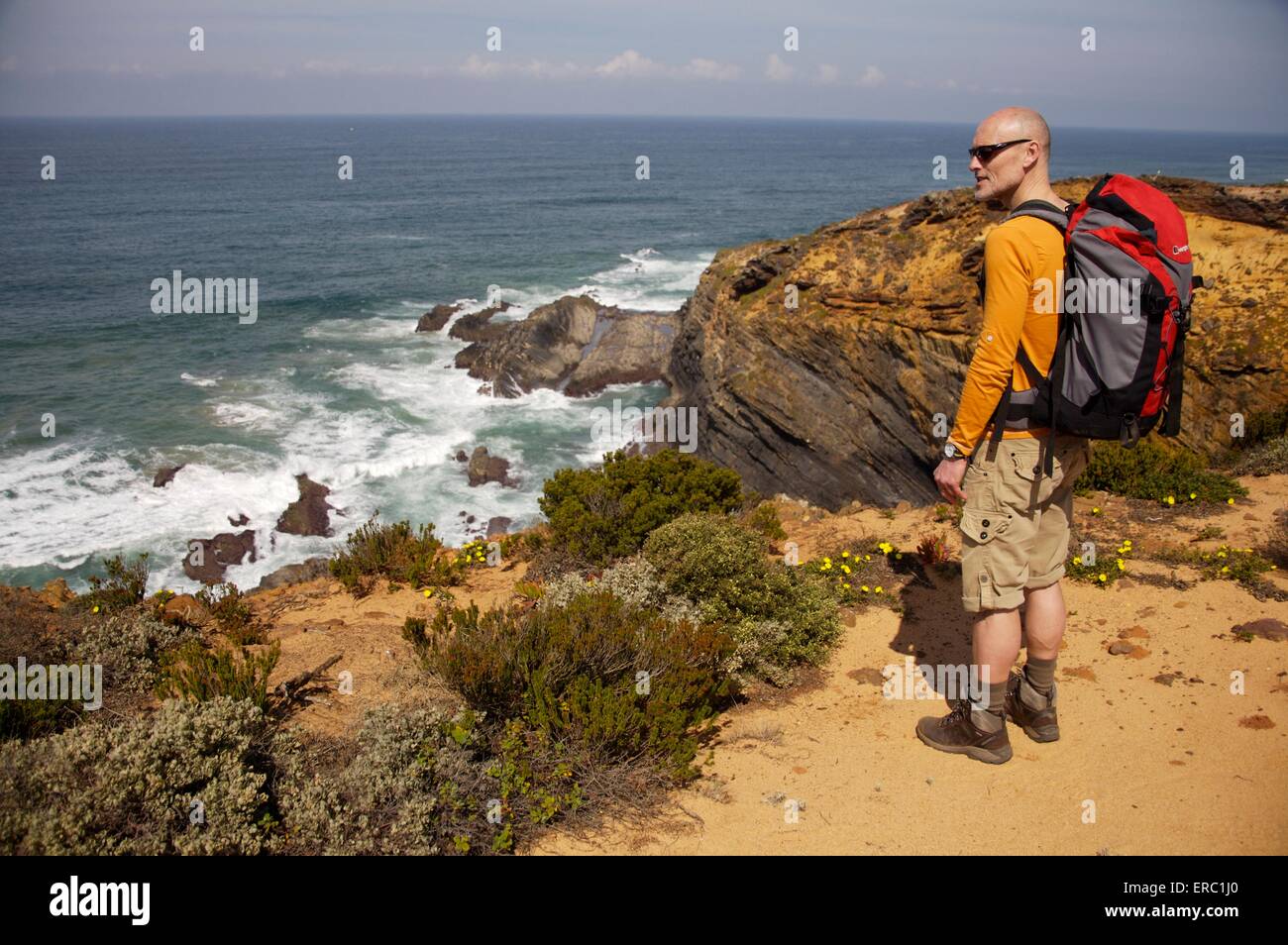 walker on Rota Vicentina, coastal walk in Alentejo, Portugal Stock Photo