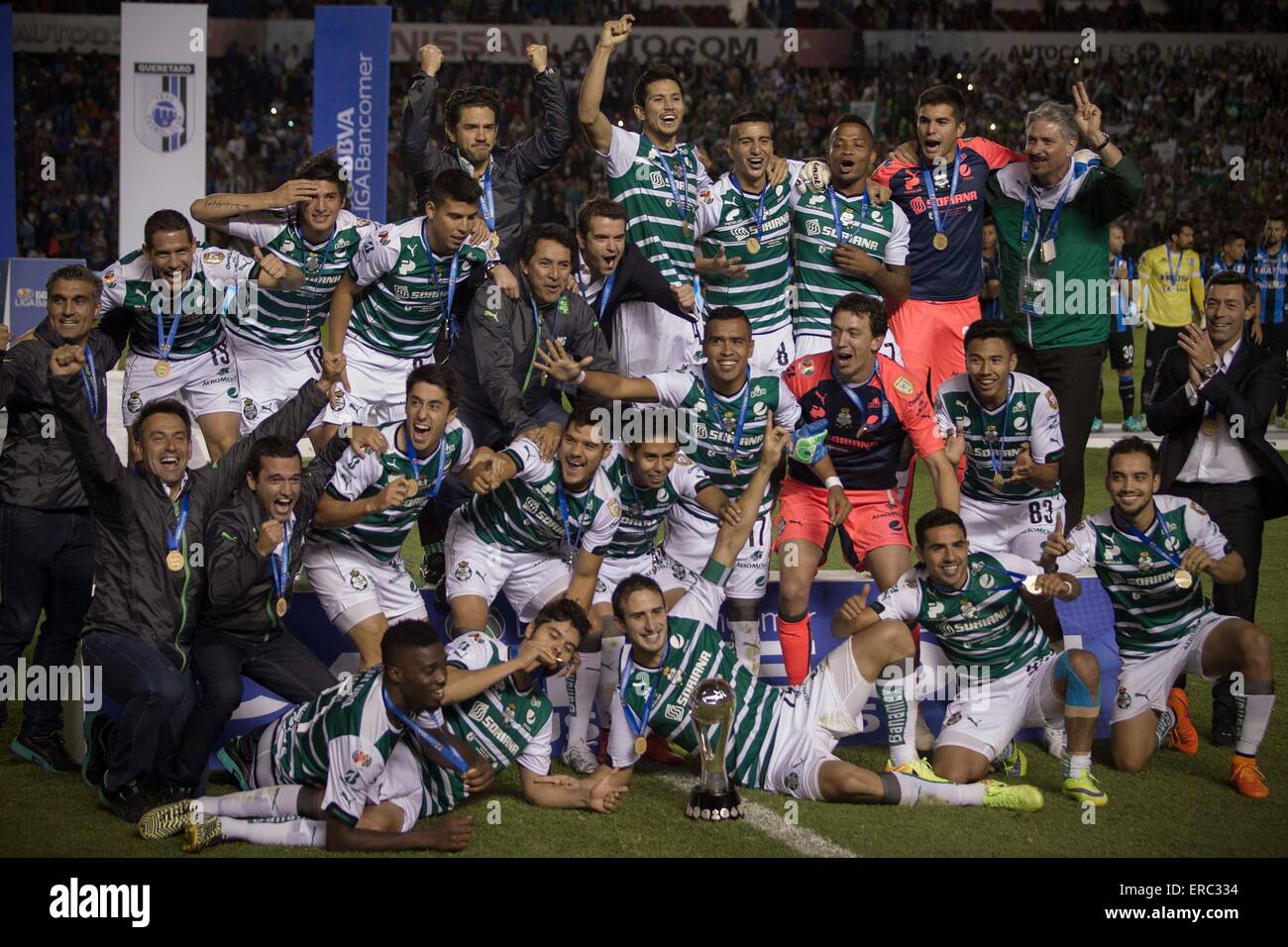 Queretaro, Mexico. 31st May, 2015. Santos' players pose with the trophy