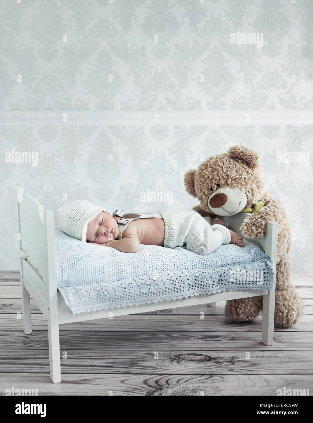 Little sleeping toddler and the teddy bear Stock Photo Alamy