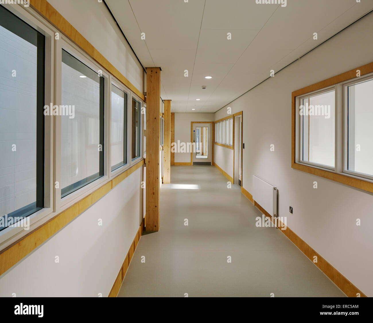 Interior corridors with fenestration. Herefordshire Archives, Hereford, United Kingdom. Architect: Architype Limited, 2015. Stock Photo