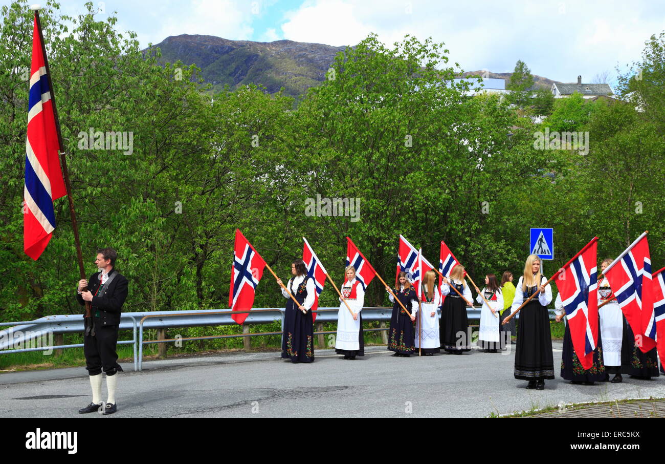 Norwegian flag bearers in national costumes on May 17, 2014, in the town of Vaksdal, Norway. Stock Photo