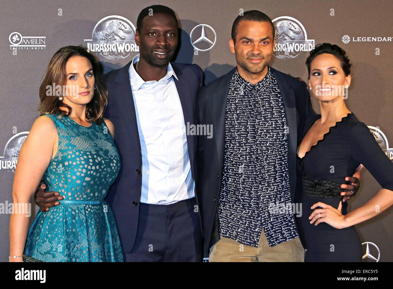 French actor Omar Sy together with his wife Helene Sy and Tony Parker with his wife Axelle Francine attend the premiere of the movie 'Jurassic World' at the UGC Normandie in Paris. On 29 of May, 2015./picture alliance Stock Photo