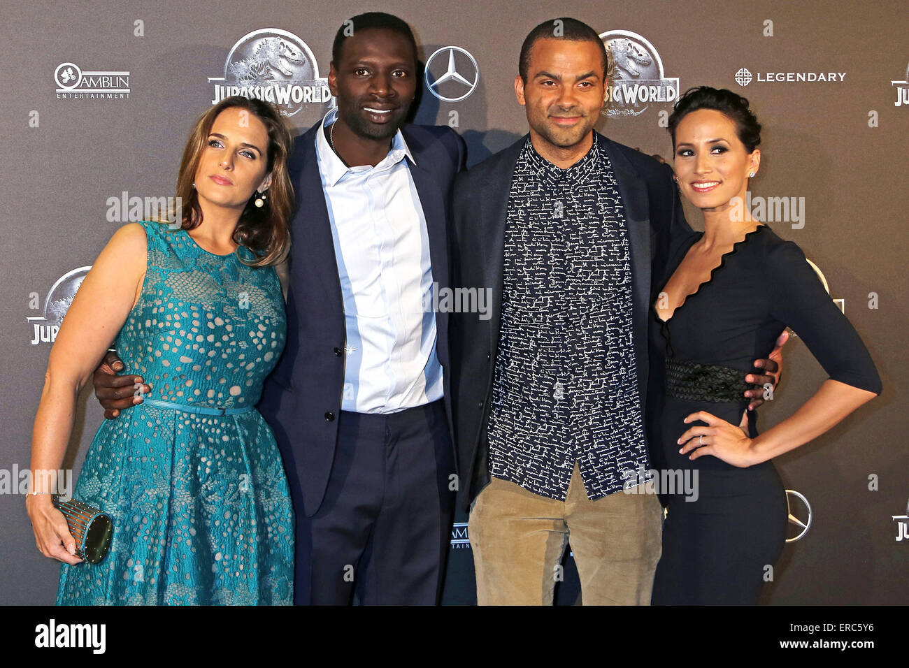 French actor Omar Sy together with his wife Helene Sy and Tony Parker with his wife Axelle Francine attend the premiere of the movie 'Jurassic World' at the UGC Normandie in Paris. On 29 of May, 2015./picture alliance Stock Photo