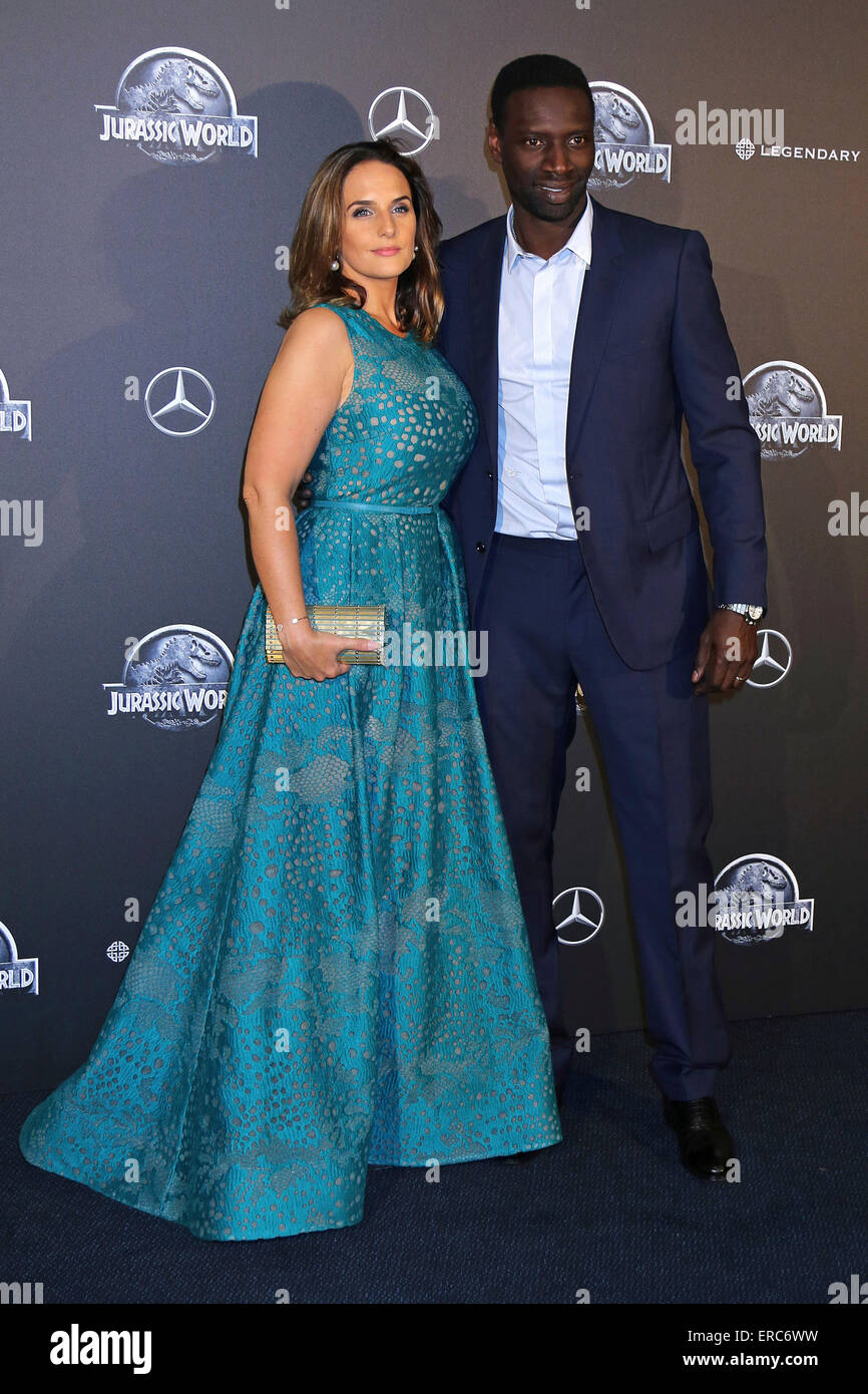 French actor Omar Sy together with his wife Helene Sy attend the premiere of the movie 'Jurassic World' at the UGC Normandie in Paris. On 29 of May, 2015./picture alliance Stock Photo