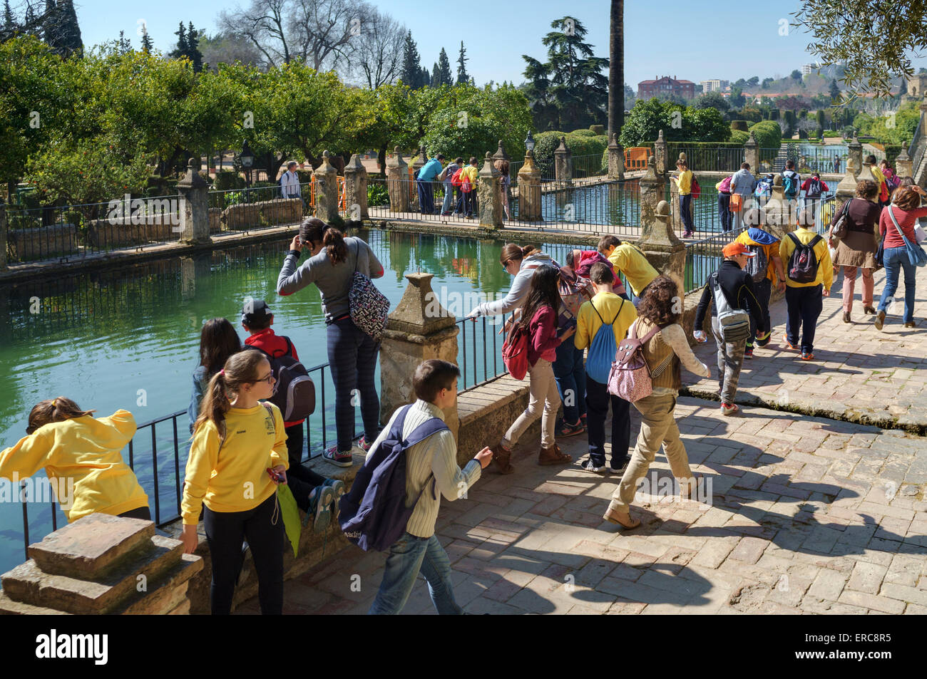 School children touring the Alcázar de los Reyes Cristianos in Cordoba Stock Photo