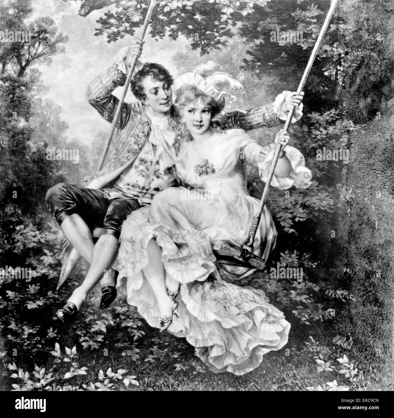 1700s ROMANTIC COUPLE MAN WOMAN LOVERS ON SWING IN GARDEN Stock Photo