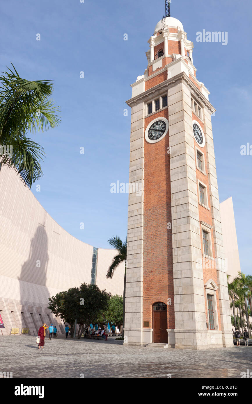 Hong Kong clock tower at Tsim Sha Tsui, Kowloon.  A landmark building, remnant of original site of the former Kowloon Station. Stock Photo
