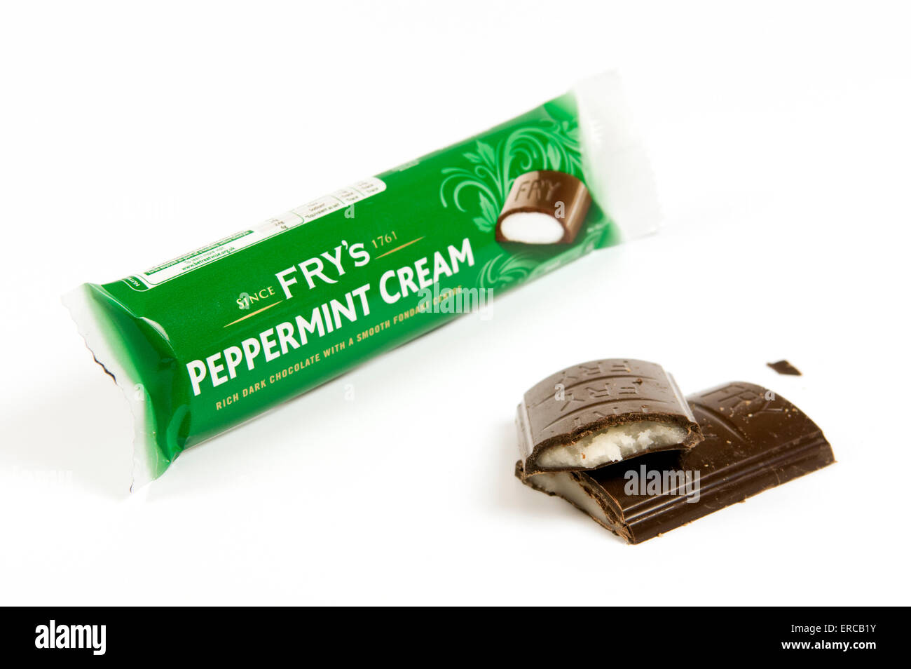 Fry's peppermint cream on white background with open cut up bar by the side Stock Photo