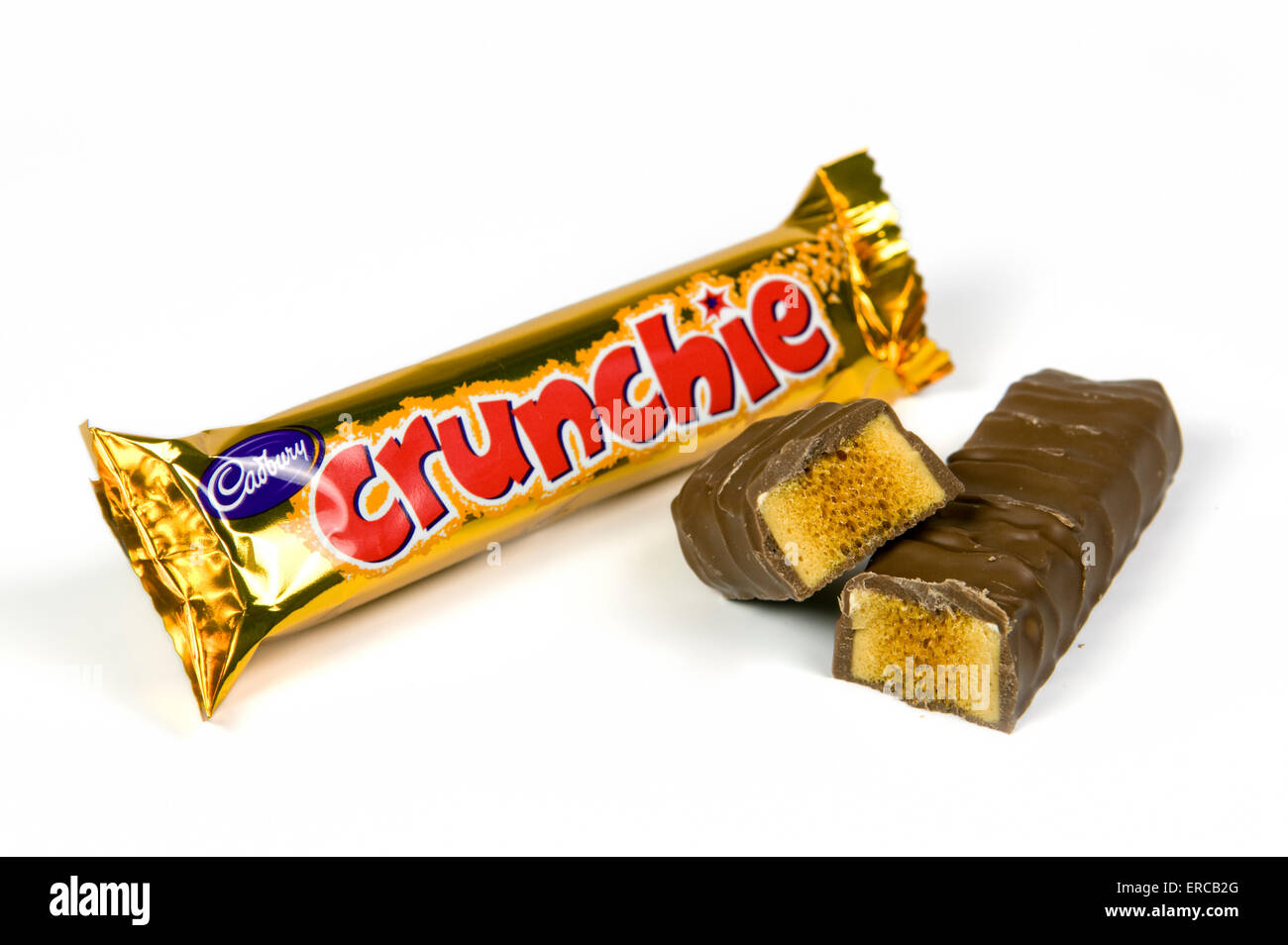 Crunchie bar on white background with open cut up bar by the side Stock Photo
