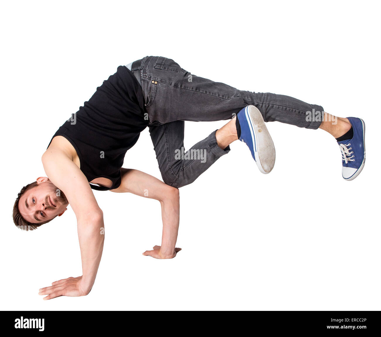 Break dancer doing handstand against  white background Stock Photo