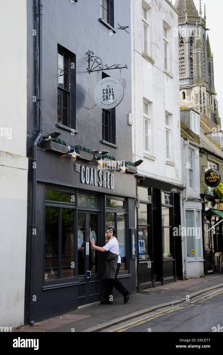 The Coal Shed restaurant in Boyces Street Brighton UK with chef walking in through front door Stock Photo