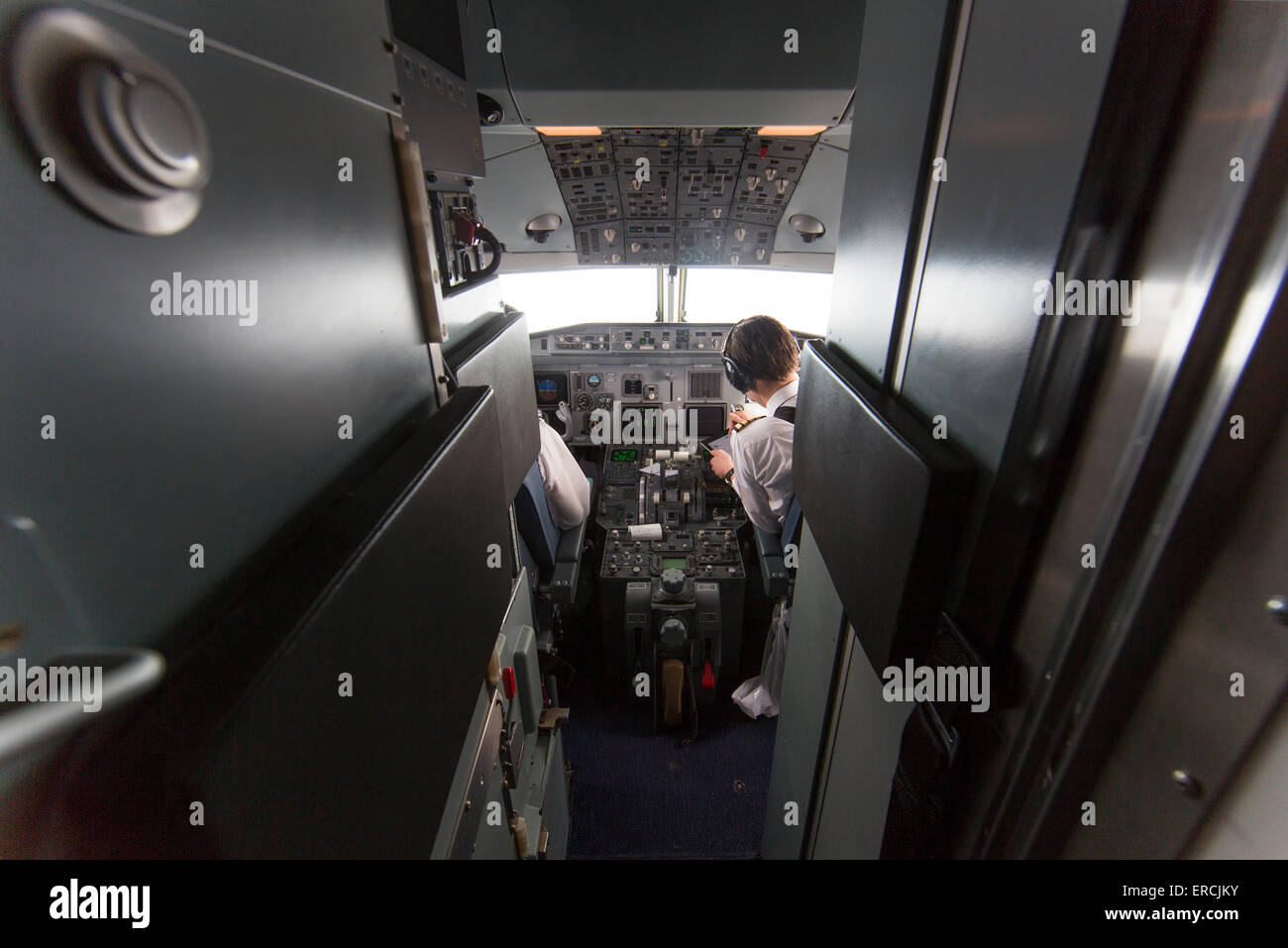 pilots in the cockpit of the KBX, Fokker 70 of the Dutch Government Stock Photo