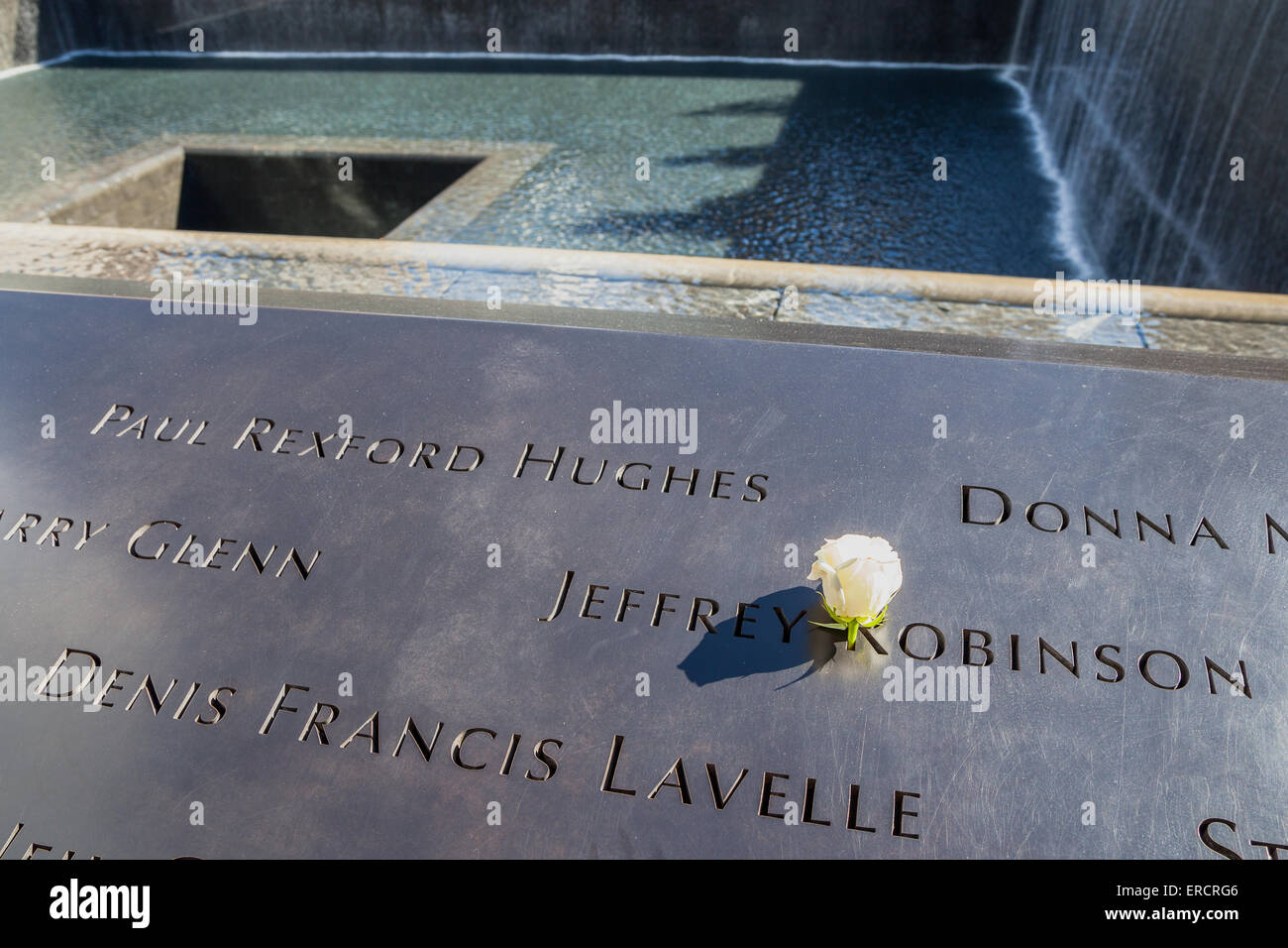 Some of the almost 3000 names forever remembered in the 911 Memorial where the Twin Towers once stood. Stock Photo
