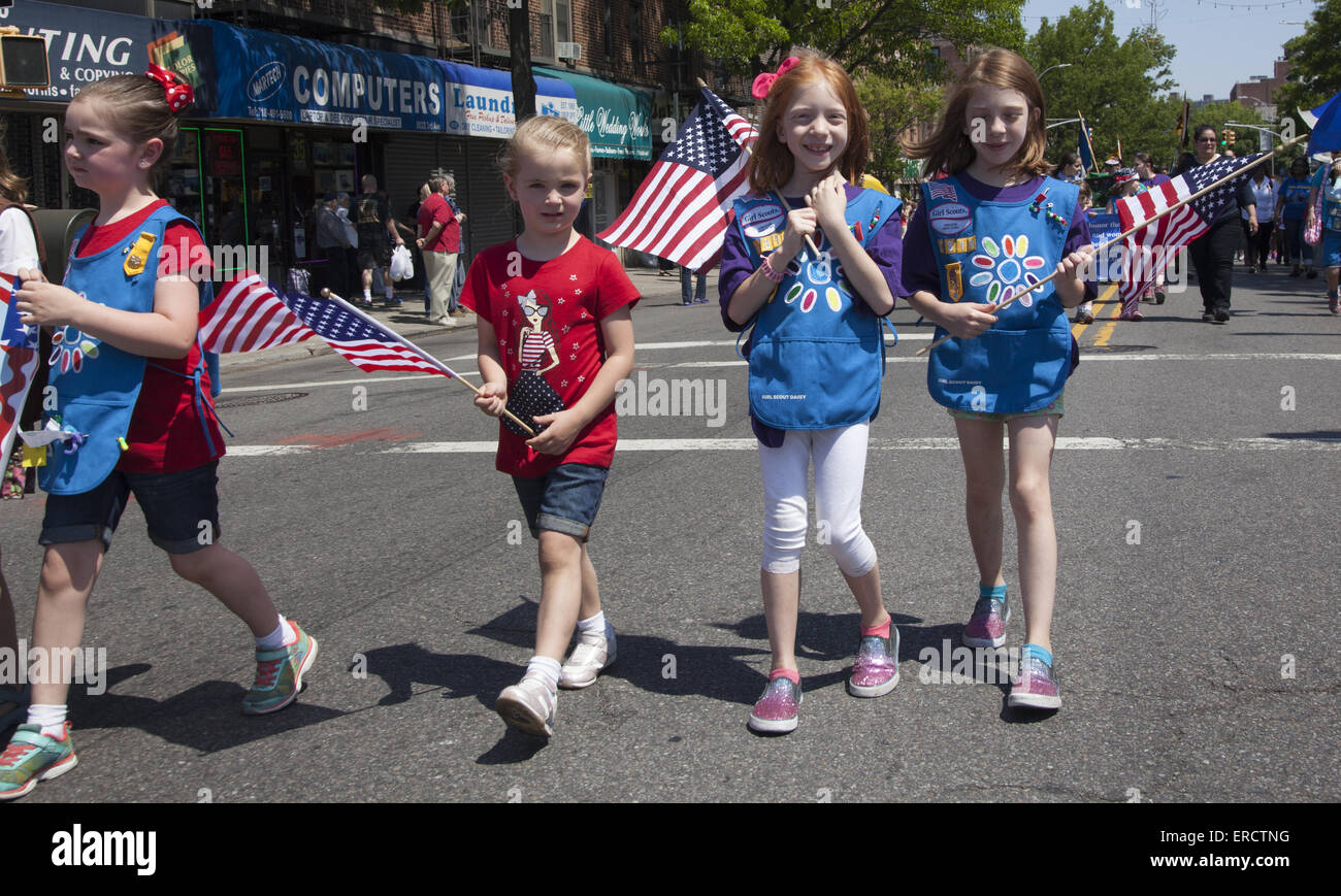 Young girl scouts from the neighborhood march  in the Memorial Day Parade in Bay Ridge, Brooklyn, NY. Stock Photo