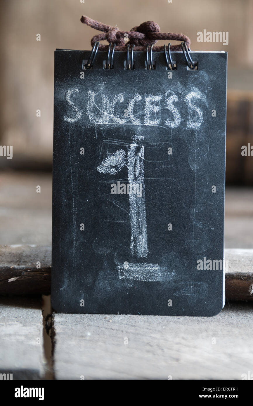 Success, first concept, chalk inscription and wooden table Stock Photo ...