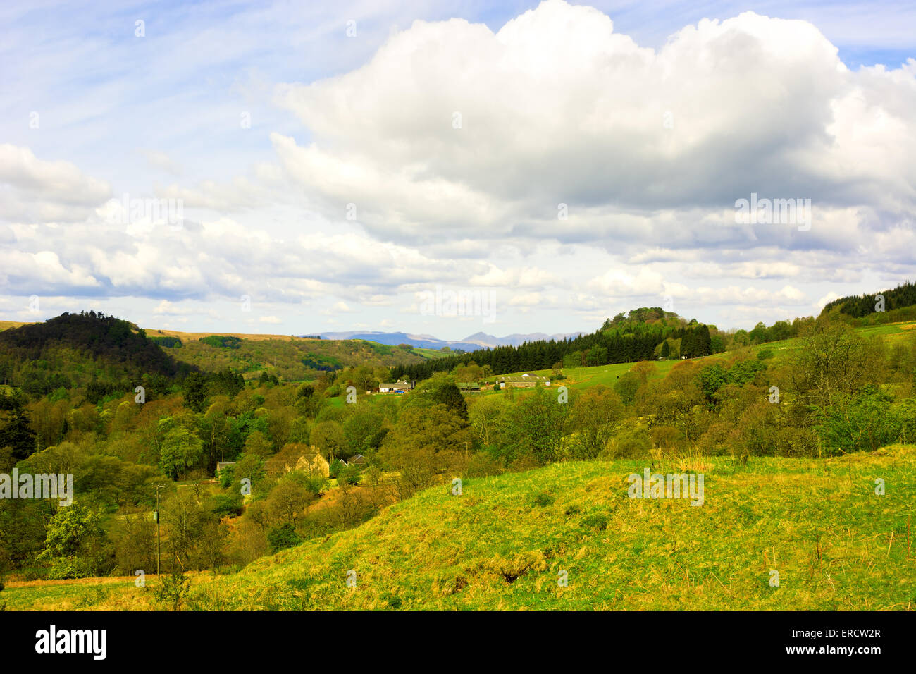 Small settlement in rural area in Highlands of Scotland, UK. Beautiful cloudy sky Stock Photo