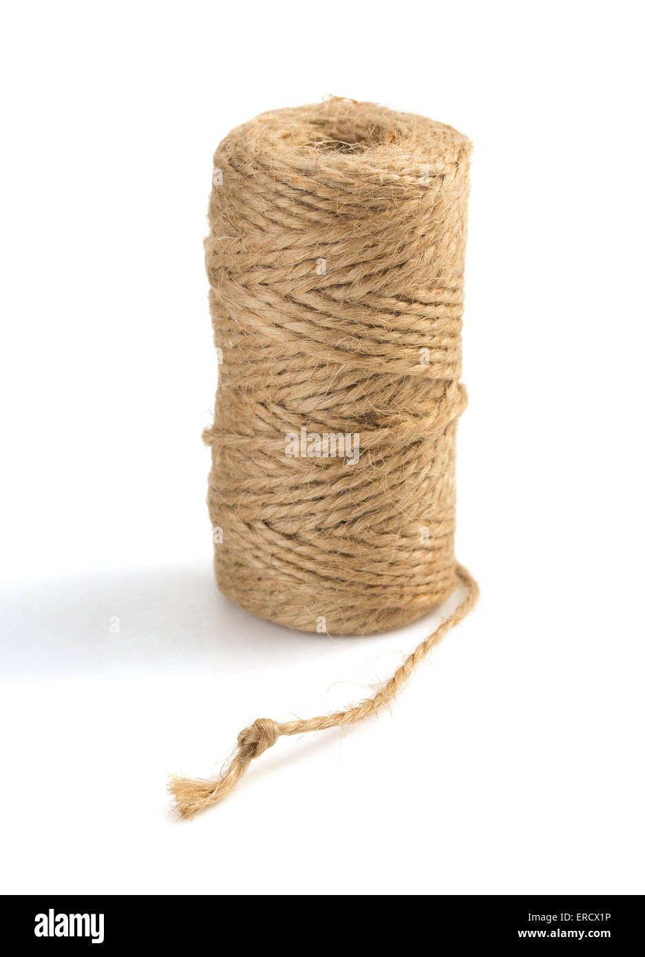 roll of twine cord and thread isolated on white background Stock Photo