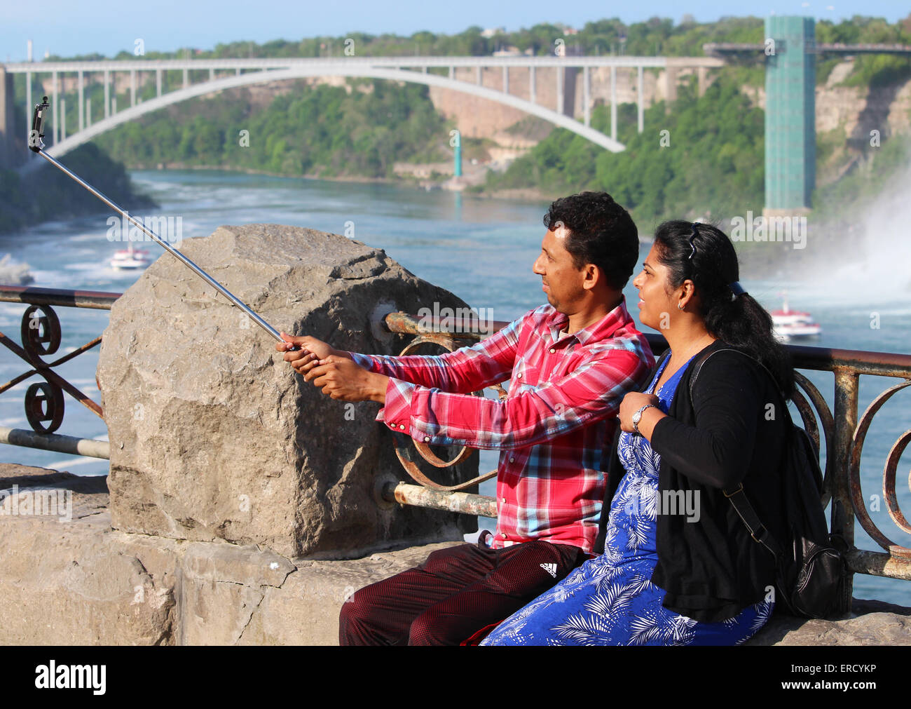 An Indian couple taking a selfie at Niagara Falls. Stock Photo