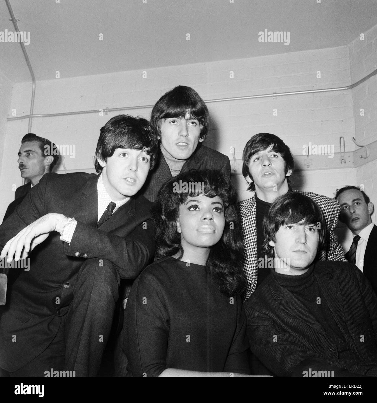 The Beatles with singer Mary Wells, ahead of the start of their UK tour with 18.15 and 20.40 performances at the Gaumont Theatre in Bradford, Friday 9th October 1964. Paul McCartney, George Harrison, Ringo Starr and John Lennon (not looking to happy). Stock Photo