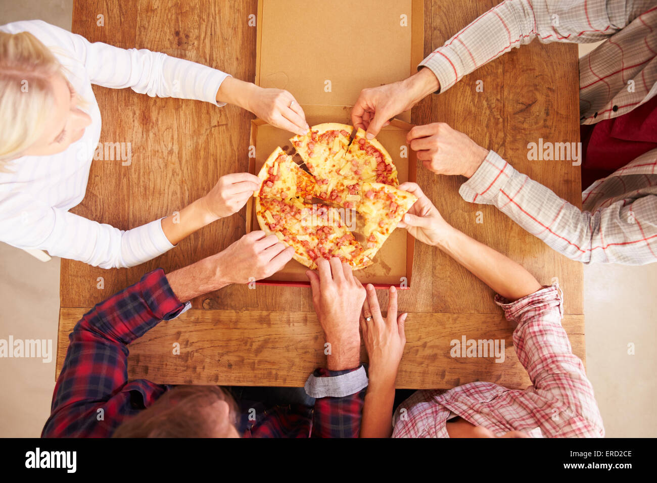 Friends Eating Pizza Together Sharing Platters Stock Photo 1038714430