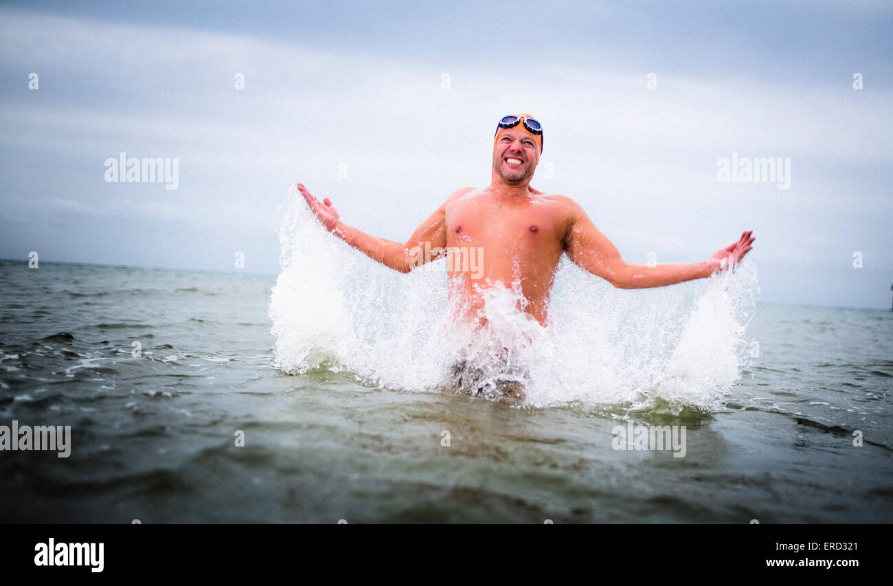Simon Cooke (47) from Brighton, returns from his daily training outing as he gets ready to swim the English Channel. Stock Photo