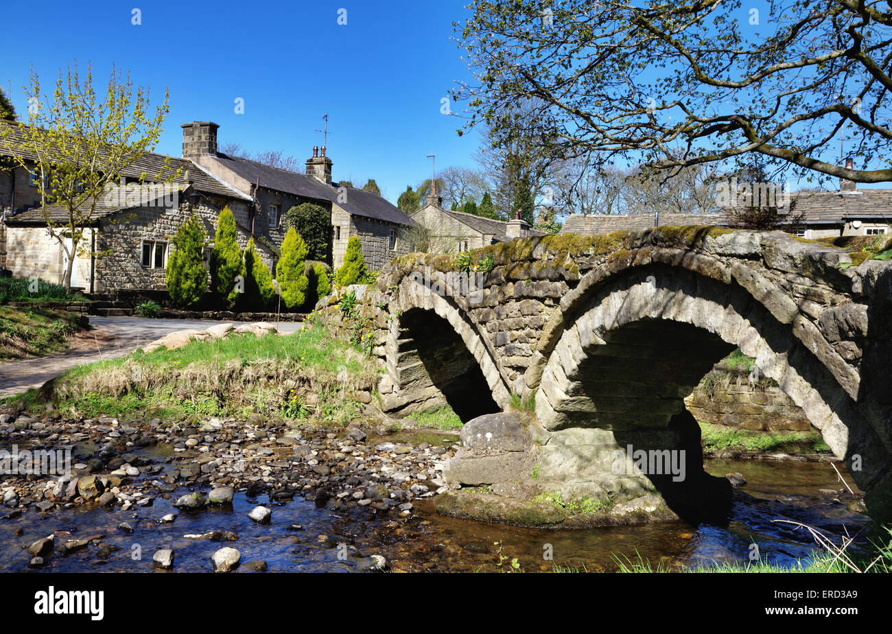 Thirteenth century packhorse bridge and the village of Wycoller Stock ...