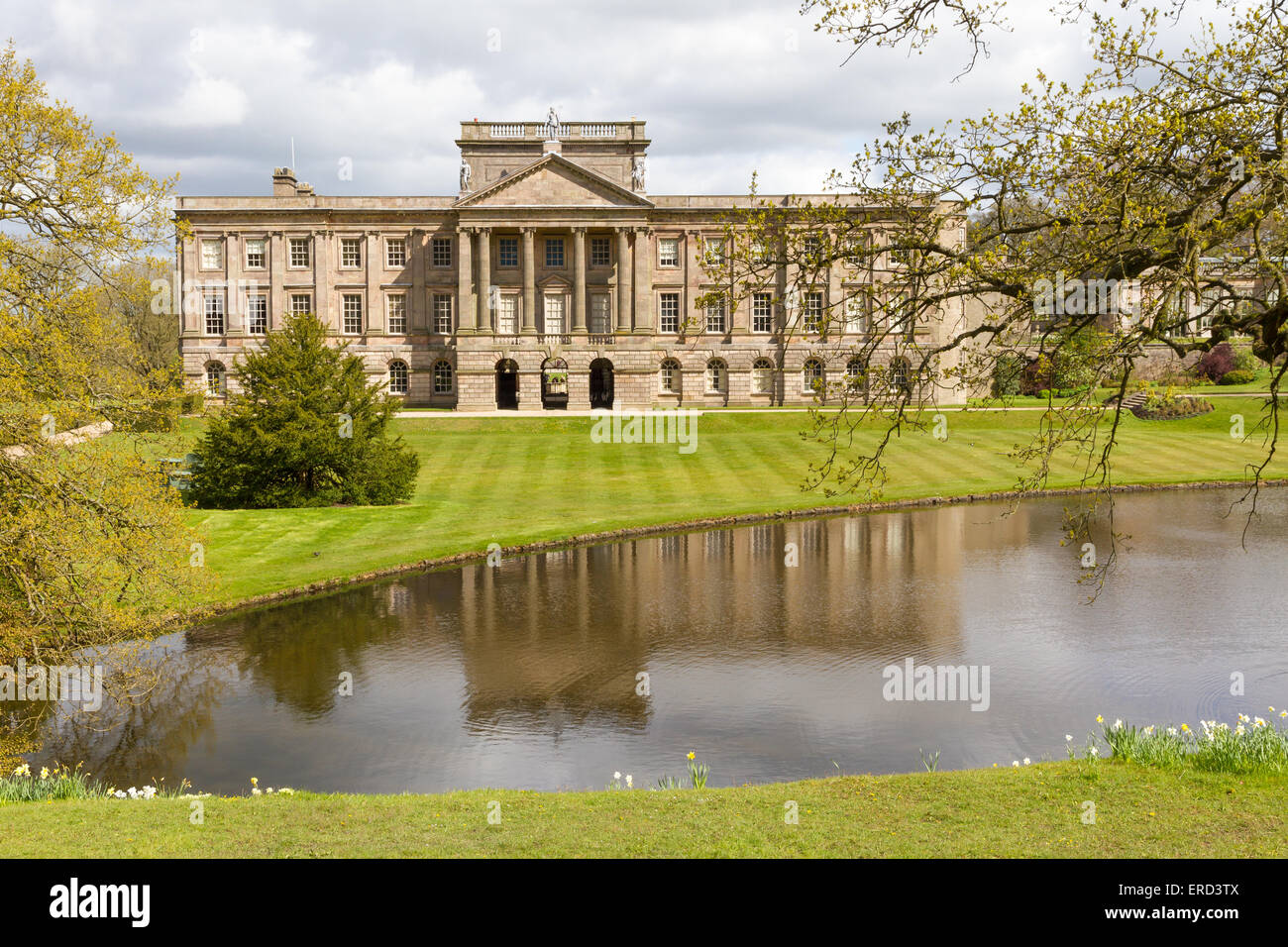 Lyme Park Mansion House viewed across the pond, Disley, Cheshire. Stock Photo