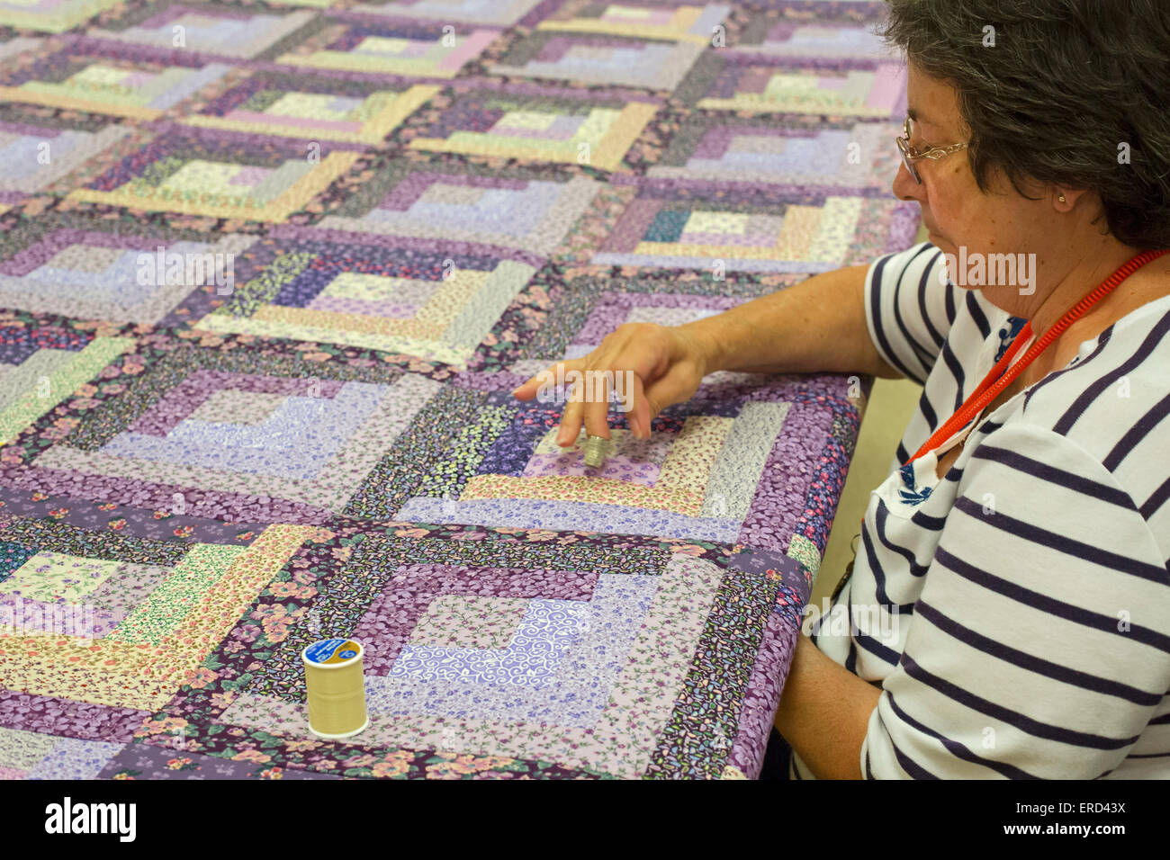 Eunice, Louisiana - A quilting demonstration at the National Park Service's Prairie Acadian Cultural Center. Stock Photo