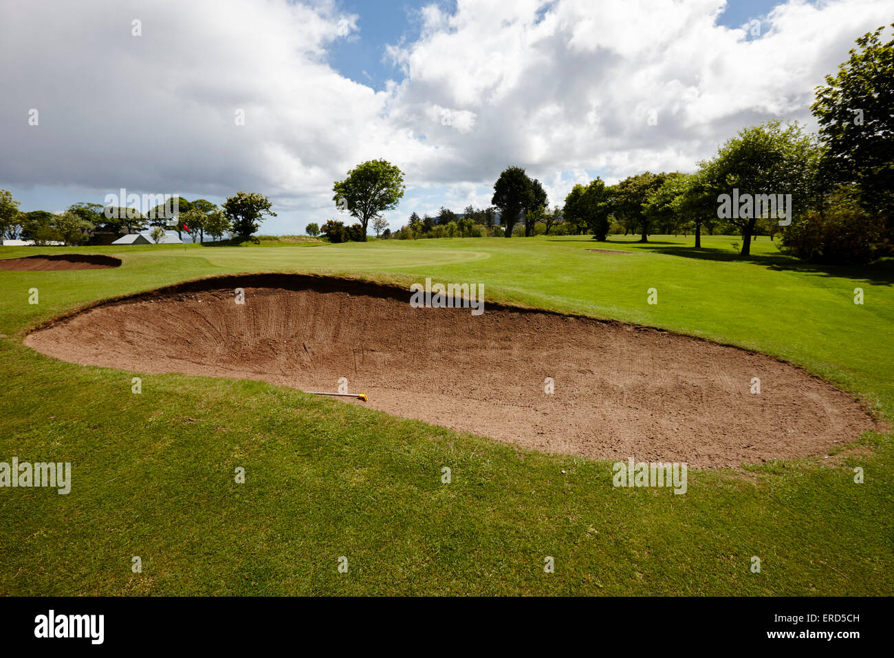sand bunker with a view of the pin at Cushendall golf club County Antrim Northern Ireland UK Stock Photo