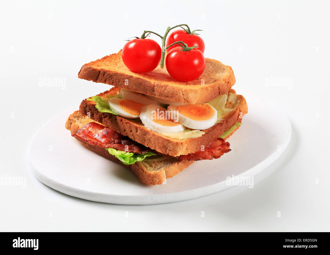 Bacon and egg sandwich - studio shot Stock Photo
