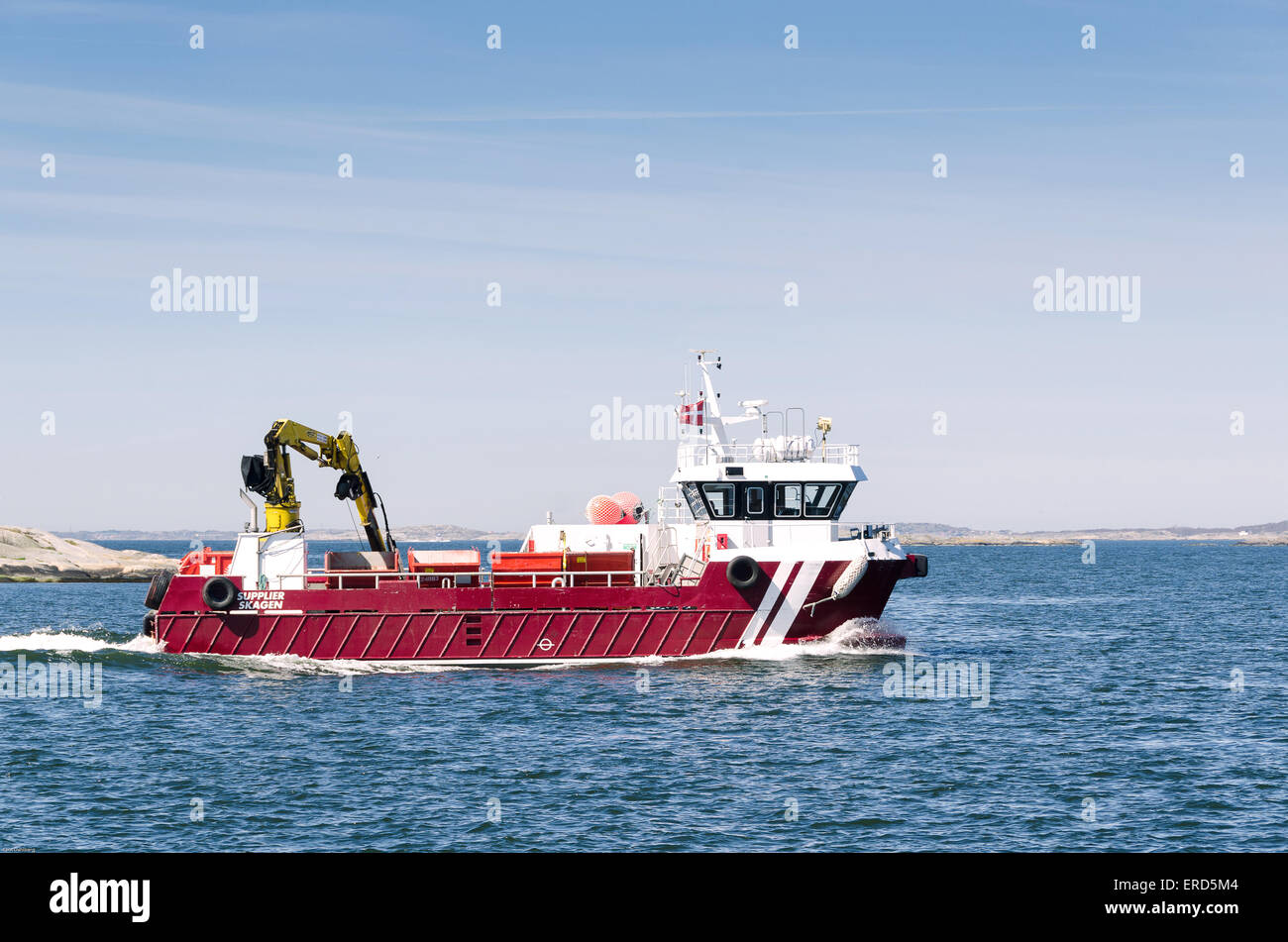 Working boat in gothenburg on the way to job Stock Photo Alamy