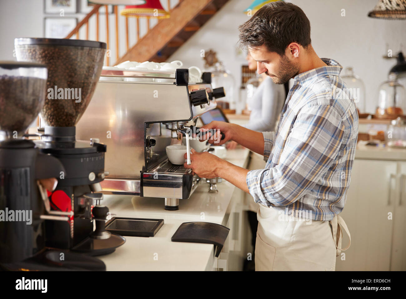 Barista at work in a cafe Stock Photo Alamy
