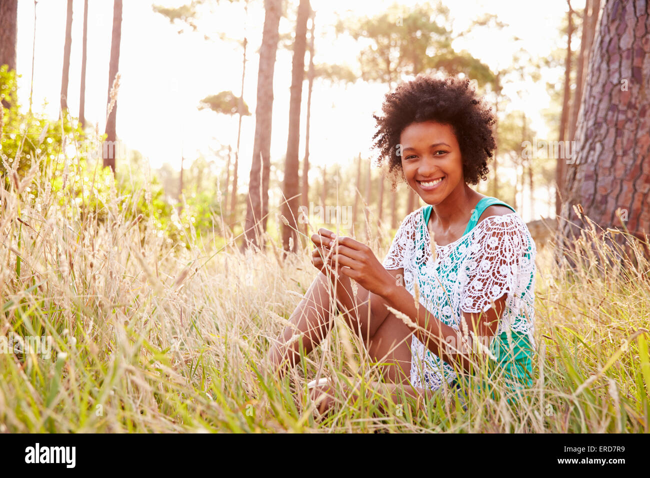 Portrait sitting smiling hi-res stock photography and images - Alamy