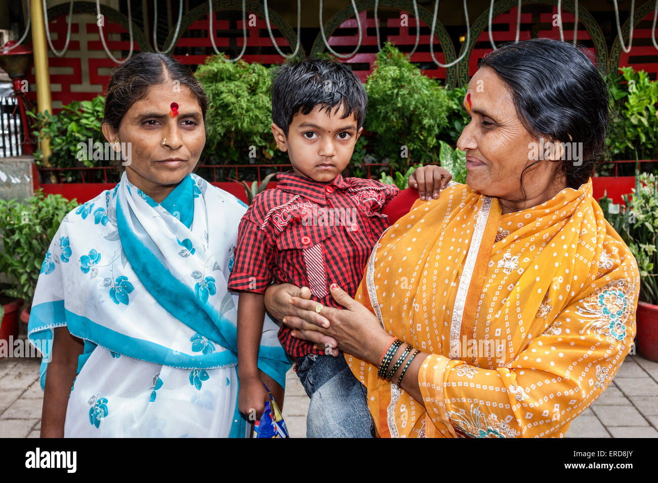 Mumbai India,Churchgate,Veer Nariman Road,woman female women,mother,grandmother,son,male boy boys kids children grandson,family families parent parent Stock Photo