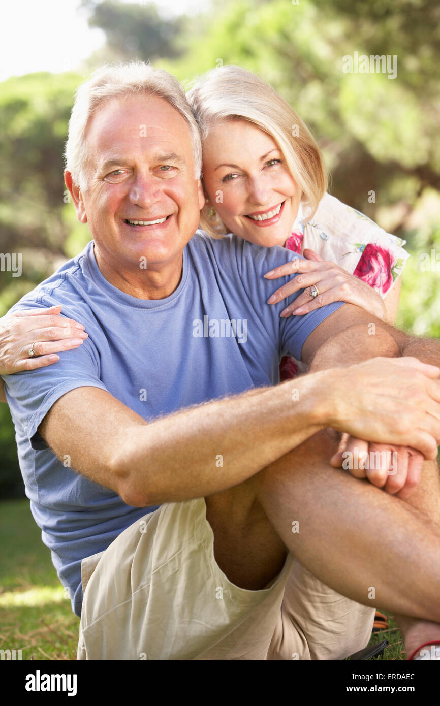 Portrait Of Senior Couple Relaxing In Countryside Stock Photo - Alamy