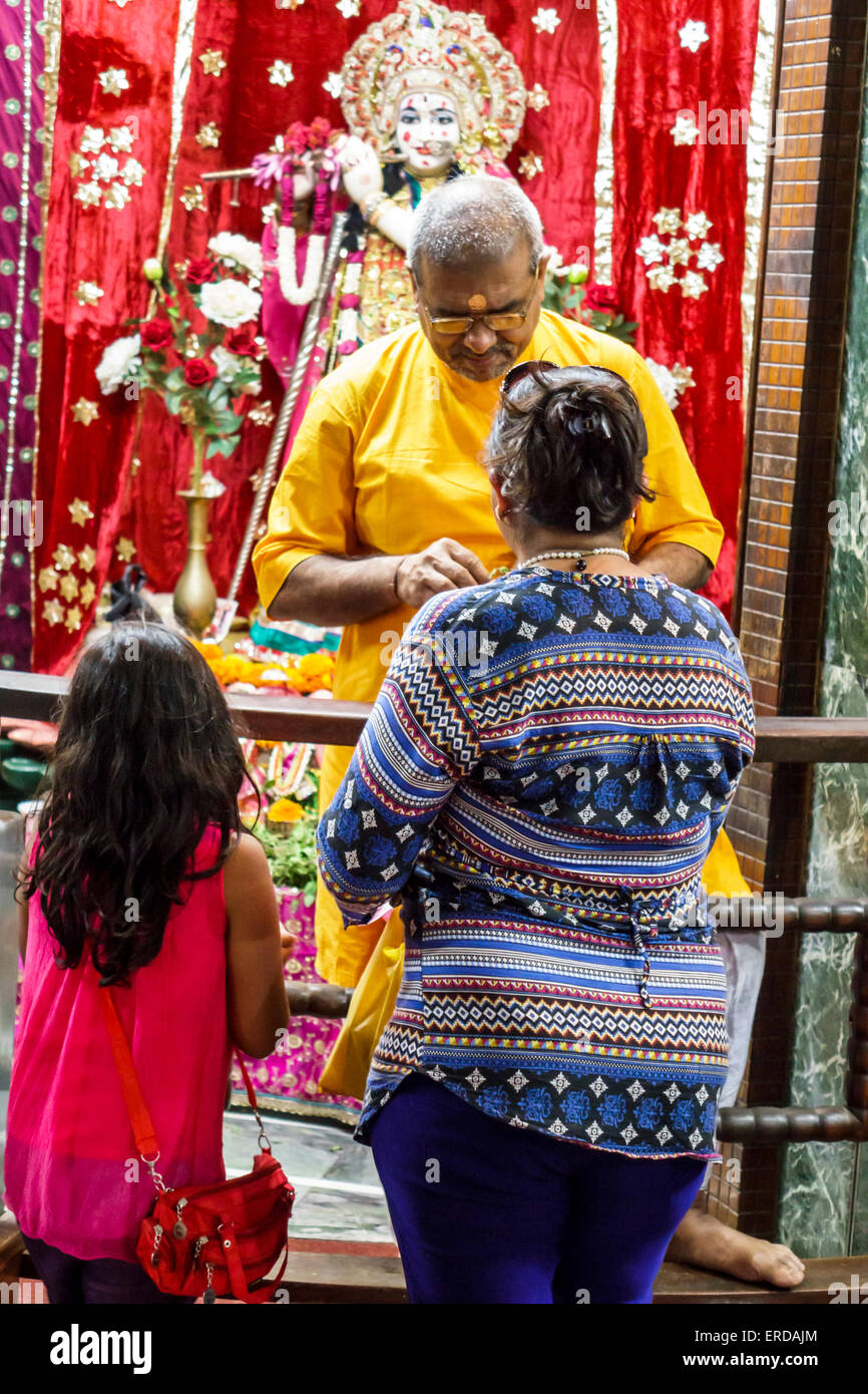 Mumbai India,Indian Asian,Breach Candy,Cumballa Hill,Shri Sadhubella Krishna Temple,religion,religious,interior inside,girl girls,youngster youngsters Stock Photo