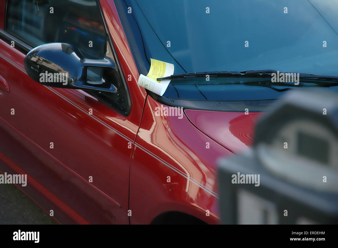 Parking ticket on car at expired meter Stock Photo Alamy