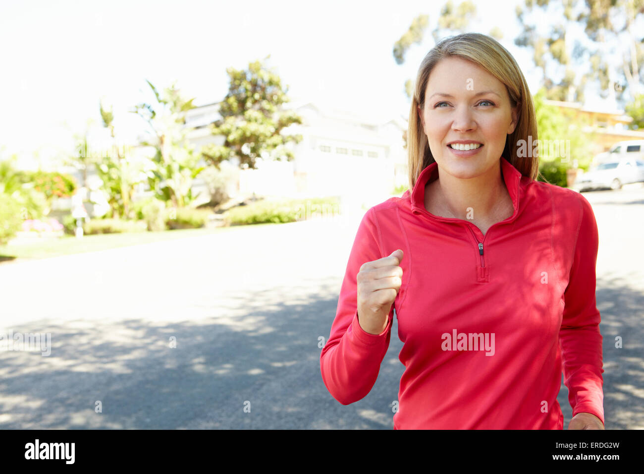 Woman out for a run Stock Photo - Alamy