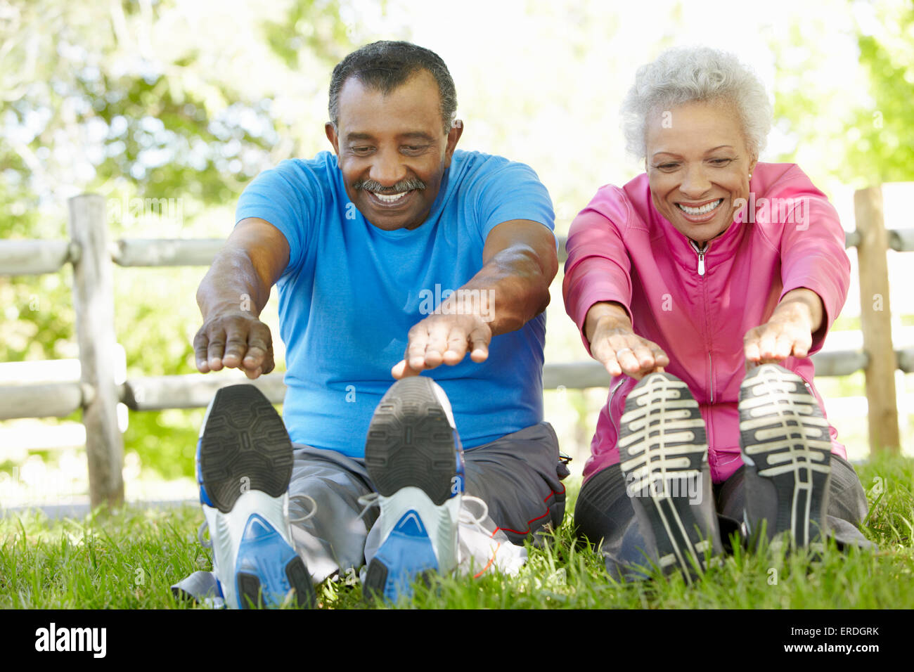 Senior African American Couple Exercising In Park Stock Photo - Alamy