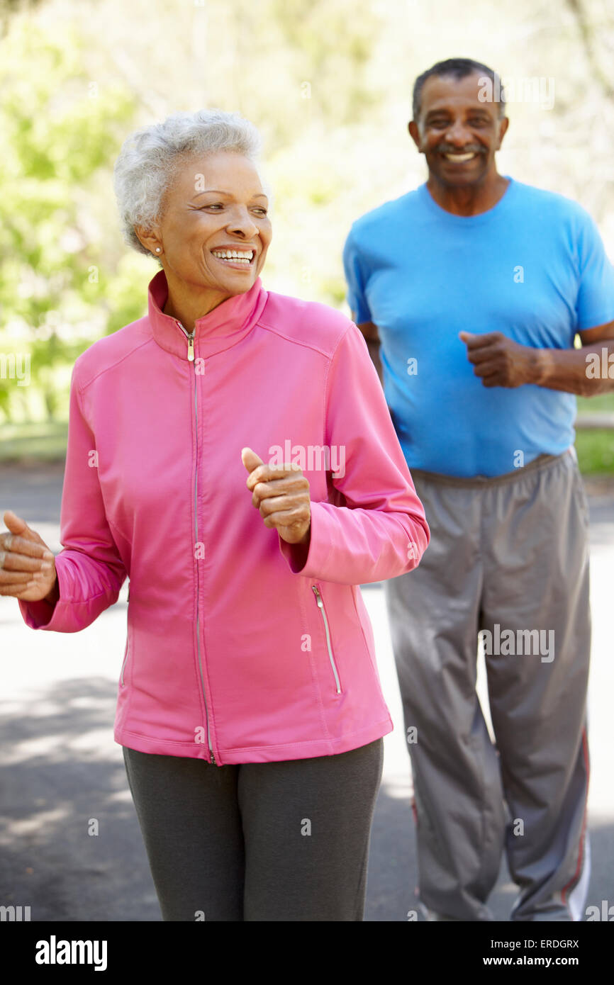 Senior African American Couple Jogging In Park Stock Photo - Alamy