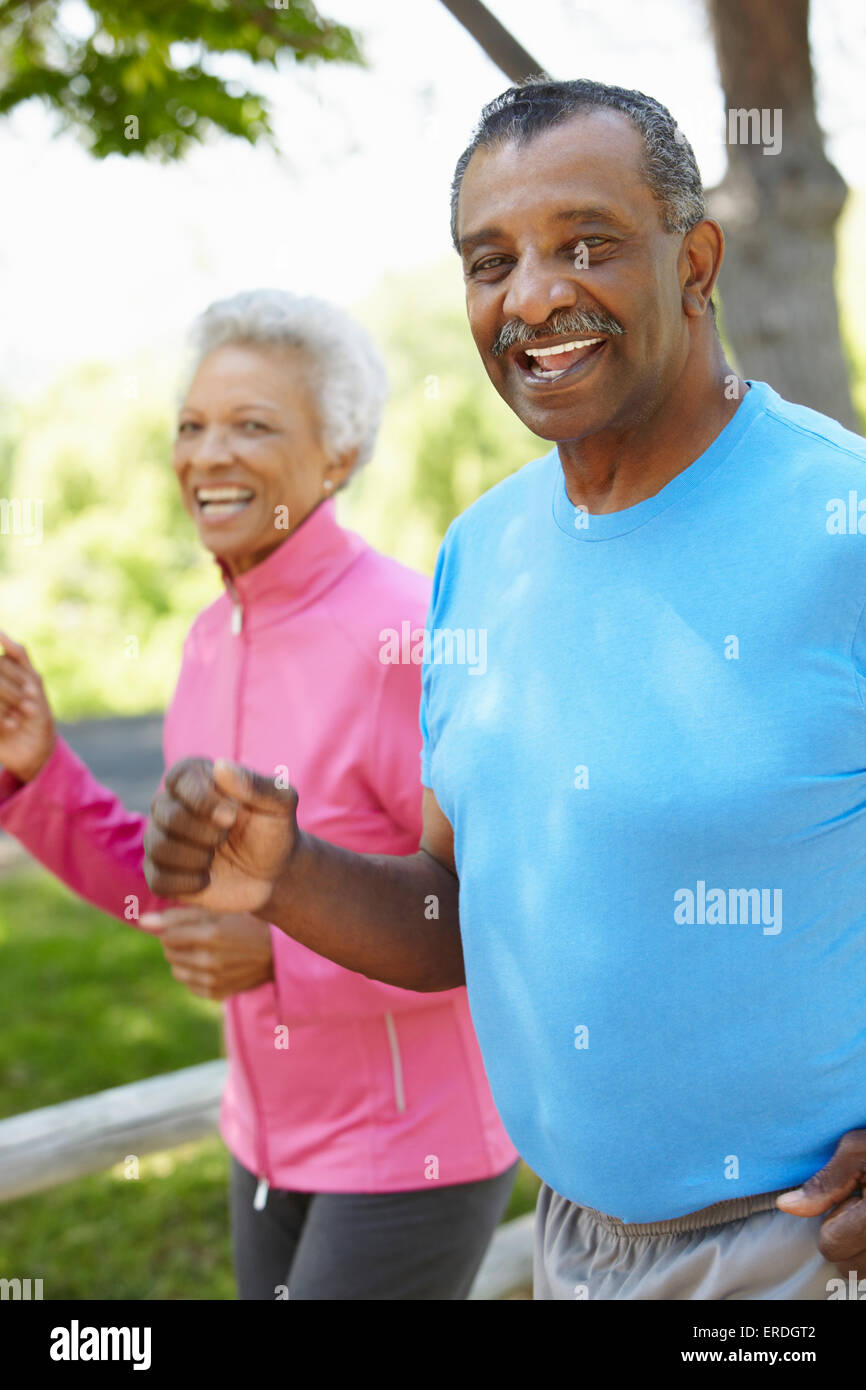 Senior African American Couple Jogging In Park Stock Photo - Alamy